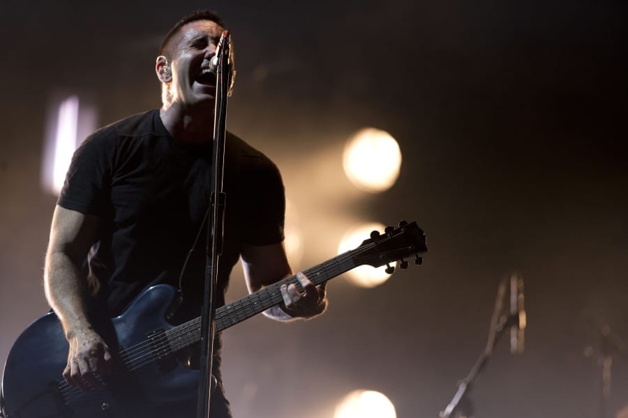 Trent Reznor of Nine Inch Nails performs in 2014 at the Vive Latino music festival in Mexico City, Mexico. The band was be inducted into the Rock and Roll Hall of Fame on Saturday.
