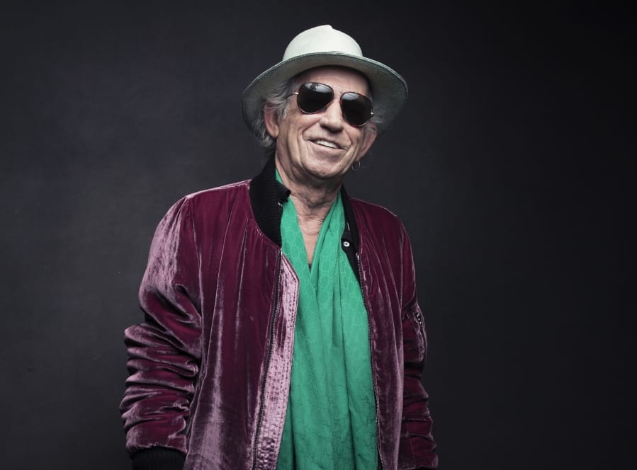 FILE - In this Nov. 14, 2016 file photo, Keith Richards of the Rolling Stones poses for a portrait in New York. On Friday, Richards is releasing a limited edition box set of his 1988 concert at the Hollywood Palladium taken during his first solo tour.