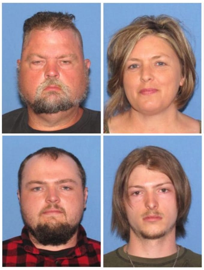 FILE - These undated file images released by the Ohio Attorney General&#039;s office, show, top row from left, George &quot;Billy&quot; Wagner III and Angela Wagner, and bottom row from left, George Wagner IV and Edward &quot;Jake&quot; Wagner. The four members of the Wagner family were charged in the 2016 slayings of eight members of the Rhoden family in rural Ohio.  Tony Rhoden Sr., a man who lost several relatives in the mass slaying,  has filed a wrongful death lawsuit against the four suspects in the killings.