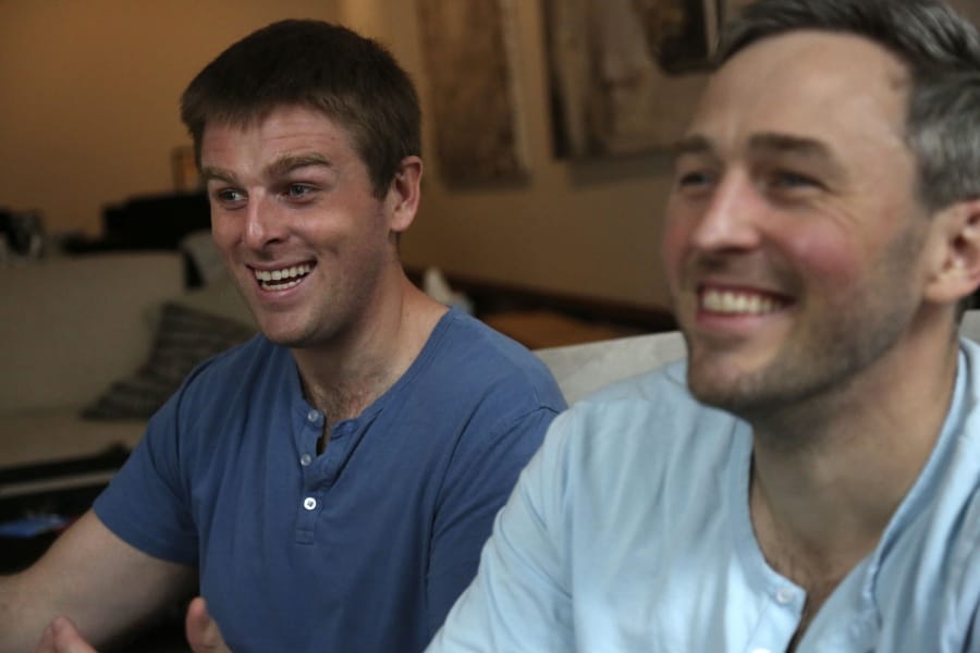 Brothers, Bryan, left, and Bradford Manning, laugh as they tell the origin story of their clothing company, Two Blind Brothers, in their New York City loft on Friday, Oct. 23, 2020. The brothers who&#039;ve lost much of their vision to a rare degenerative eye disorder began their company in 2016 and have donated all of their profits, more than $700,000, to preclinical research trials to help cure blindness.