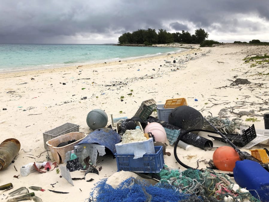 Plastic and other debris sits on the beach Oct. 22, 2019, on Midway Atoll in the Northwestern Hawaiian Islands.