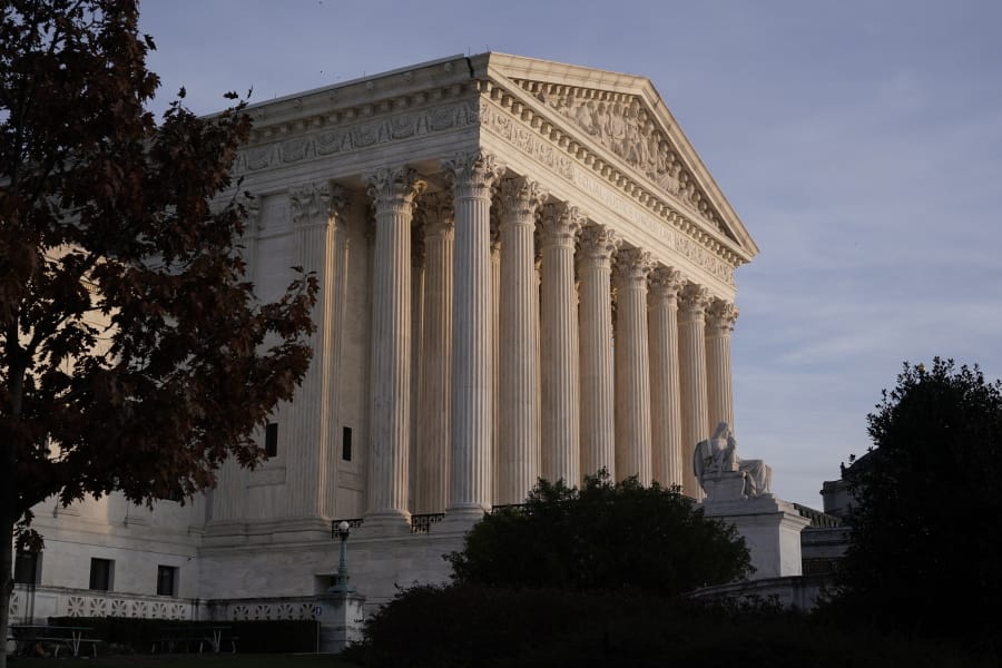 FILE - In this Nov. 5, 2020, file photo the Supreme Court is seen in Washington. The court prepares to hear arguments Tuesday in the third major legal challenge to the Affordable Care Act. (AP Photo/J.