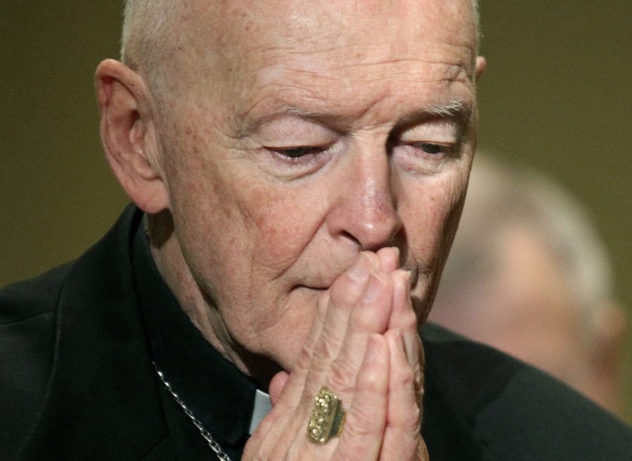 FILE - In this Nov. 14, 2011, file photo, then-Cardinal Theodore McCarrick prays during the United States Conference of Catholic Bishops&#039; annual fall assembly in Baltimore. U.S. Catholic bishops are holding their annual fall assembly virtually this week with the Vatican&#039;s recent report on the rise and fall of disgraced ex-Cardinal McCarrick one of their main topics for discussion.  Released last week after a two-year investigation, the report found that three decades of bishops, cardinals, and popes dismissed or downplayed reports McCarrick shared his bed with seminarians.