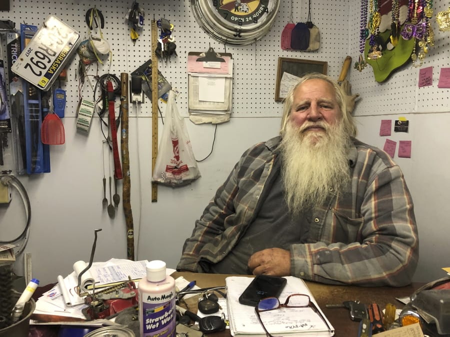 Danny Rice, 67, discusses the coronavirus in his auto repair shop in downtown Elmwood, Nebraska, on Monday, Nov. 9, 2020. Rice has continued his life as normal during the pandemic, even though he recognizes that the virus is potentially dangerous for high-risk people, including him.