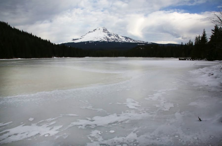 Mount Hood rises over an icy Trillium Lake in the Mount Hood National Forest.
