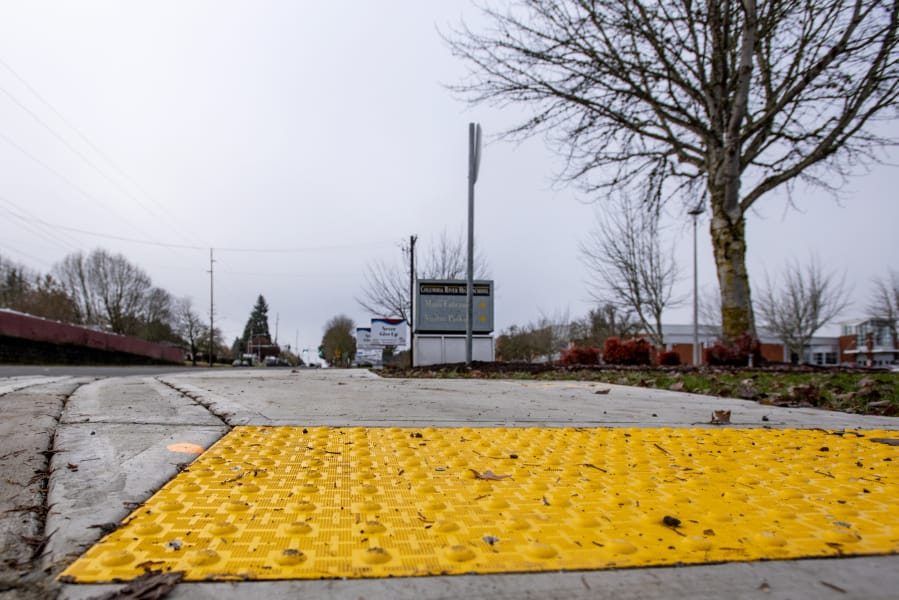 New curb cuts, like this one in front of Columbia River High School, feature a yellow pad with domes on it that help a blind person understand there’s a change and that they’re entering a roadway.