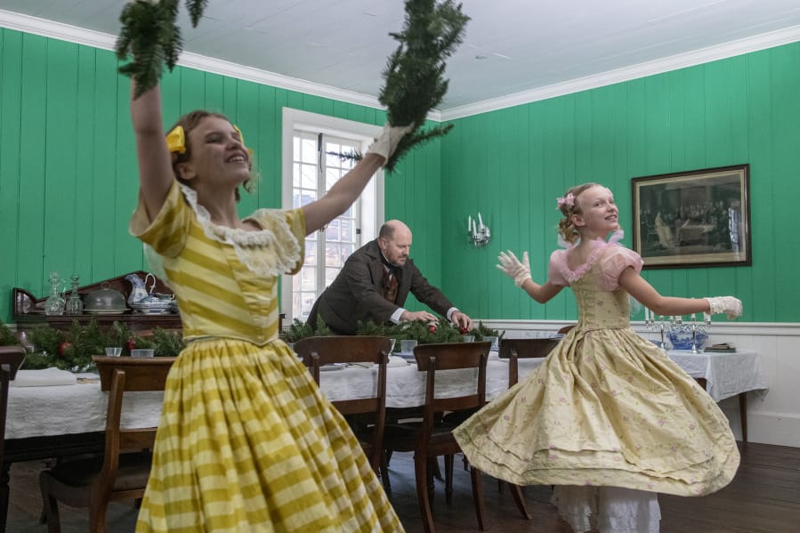 Olivia Hill, 11, left; her father, Jeffrey; and her sister Charlotte, 8, shoot a preview video for Columbia Dance&#039;s historical version of &quot;The Nutcracker&quot; at Fort Vancouver.