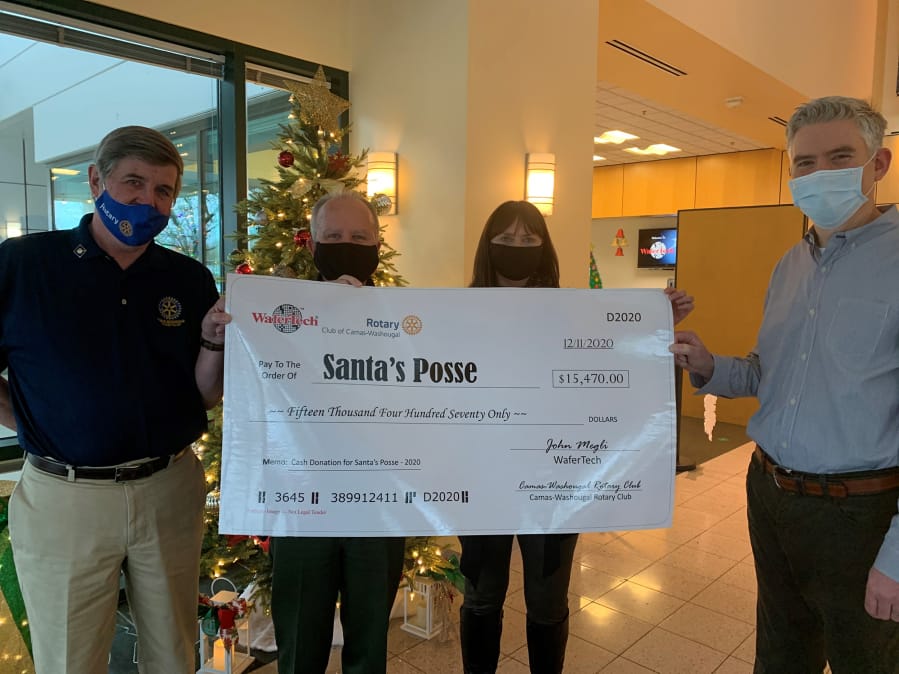 CAMAS: The Clark County Sheriff&#039;s Office Santa&#039;s Posse effort received a $15,470 donation on Dec. 11 from The Camas-Washougal Rotary Club and WaferTech to go toward toys and food that will be distributed to 1,200 families in Clark County.