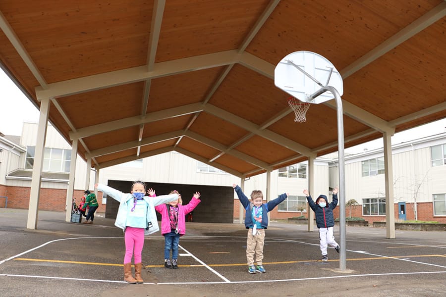 BATTLE GROUND: Kindergartners at Maple Grove Primary School under the new covered play structure.