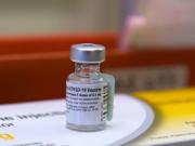 A vial with the COVID-19 vaccine is pictured at PeaceHealth Urgent Care Memorial on Tuesday morning, December 22, 2020.