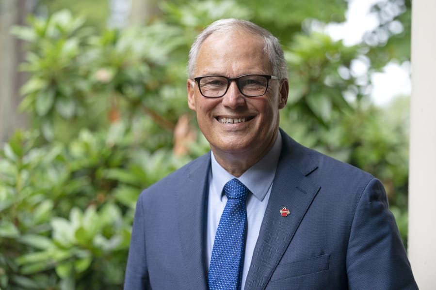 Washington Gov. Jay Inslee poses for a photo, Friday, Sept. 25, 2020, in Olympia, Wash.  (AP Photo/Ted S.