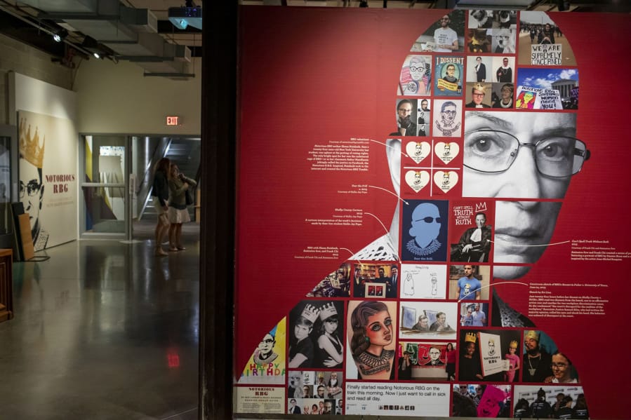 People tour the Notorious RBG exhibit about Ruth Bader Ginsburg on Sept. 24 at the Illinois Holocaust Museum in Skokie, Ill.
