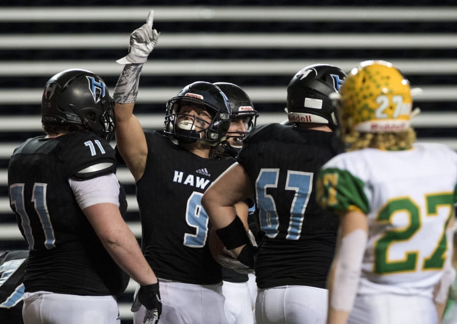Hockinson&#039;s Sawyer Racanelli (9) celebrates a touchdown during the 2A state football championship game against Lynden on Saturday, Dec. 1, 2018, in Tacoma, Wash.