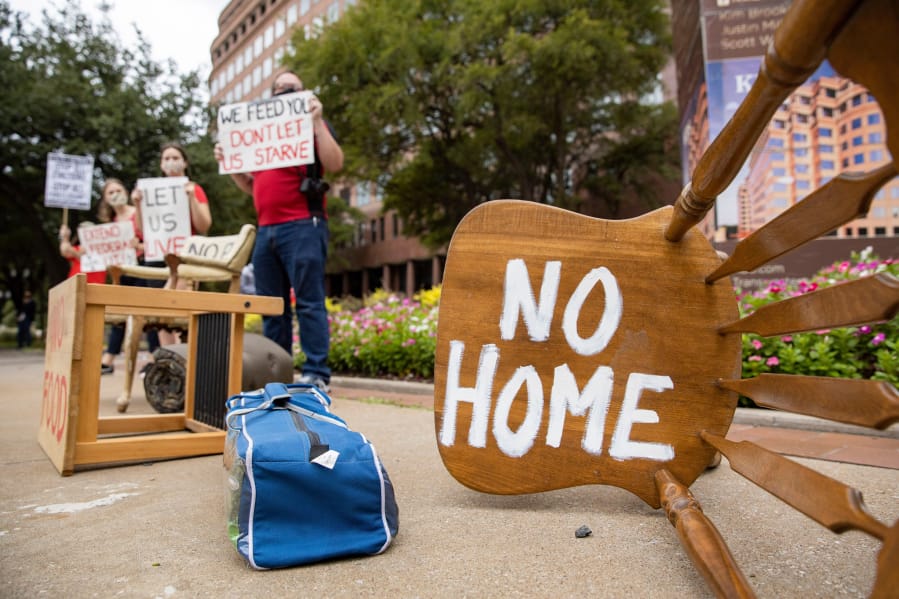 Protesters place furniture and rally outside the Dallas office of Sen. John Cornyn, R-Texas, &quot;to show him the reality of the eviction crisis&quot; in this Sept. 1 file photo.