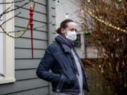Heather Frey outside of her Seattle home on Dec. 15, 2020. Frey has been filing for pandemic unemployment assistance since March and, as of earlier this week, hadn’t received a single payment yet.