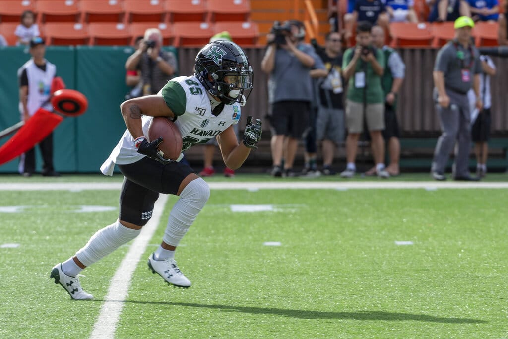 Hawaii wide receiver Lincoln Victor (85) returns a kickoff in the first half of the Hawaii Bowl NCAA college football game, Tuesday, Dec. 24, 2019, in Honolulu.