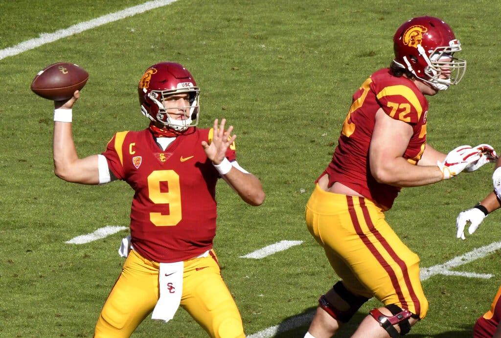 Quarterback Kedon Slovis #9 of the USC Trojans passes against Arizona State Sun Devils in the first half of a NCAA football game at the Los Angeles Memorial Coliseum in Los Angeles on Saturday, November 7, 2020.