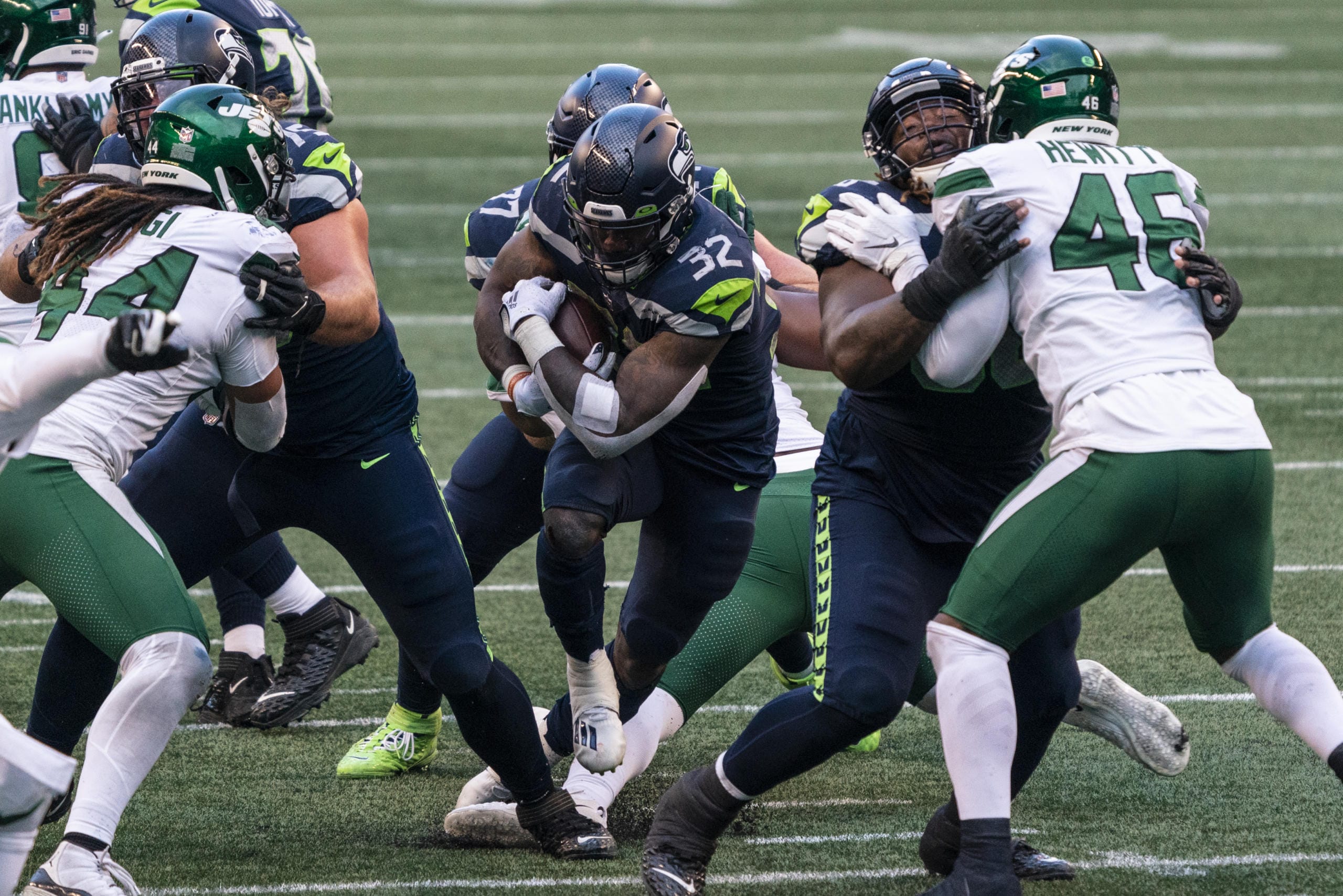 Seattle Seahawks running back Chris Carson runs the ball during the second half of an NFL football game against the New York Jets, Sunday, Dec. 13, 2020, in Seattle. The Seahawks won 40-3.