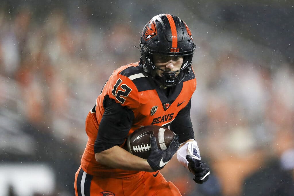 Oregon State inside linebacker Jack Colletto (12) rushes for a touchdown during the second half of an NCAA college football game against Arizona State in Corvallis, Ore., Saturday, Dec. 19, 2020. Arizona State won 46-33.