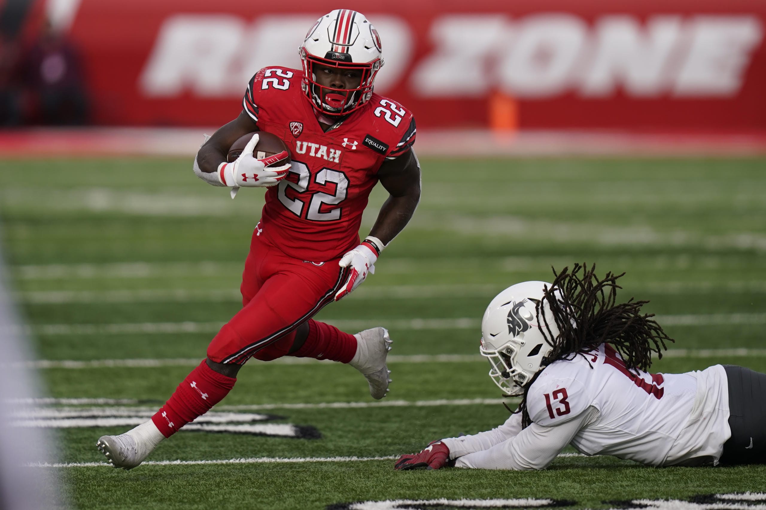 Utah running back Ty Jordan (22), a star freshman running back for the University of Utah who grew up in the Dallas area, has died, school officials announced Saturday, Dec. 26, 2020. Authorities in Texas and Utah have not released details about the circumstances of the Jordan's death. He finished the 2020 season by rushing for 154 yards and three touchdowns against Washington State on Dec. 19, 2020.
