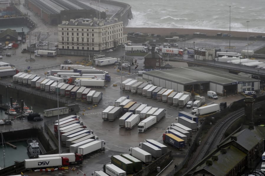 Lorries are parked near the port, Monday, Dec. 21, 2020, after the Port of Dover, England, was closed and access to the Eurotunnel terminal suspended following the French government&#039;s announcement. France banned all travel from the UK for 48 hours from midnight Sunday, including trucks carrying freight through the tunnel under the English Channel or from the port of Dover on England&#039;s south coast.