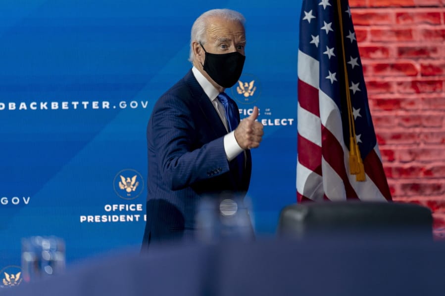 President-elect Joe Biden departs a news conference after introducing his nominees and appointees to economic policy posts at The Queen theater, Tuesday, Dec. 1, 2020, in Wilmington, Del.