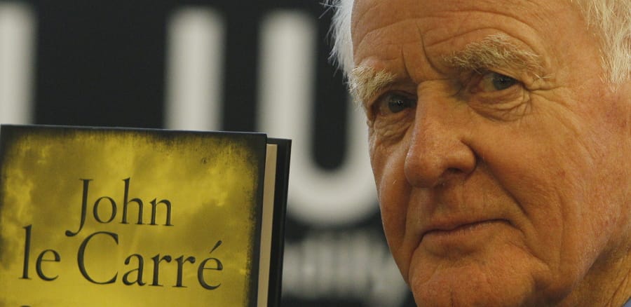 British author John le Carre holds a copy of his new book entitled &#039;Our Kind of Traitor&#039; at a central London bookstore during a book signing event to mark the launch of the novel in London Thursday, Sept. 16, 2010. John le Carre, the spy-turned-novelist whose elegant and intricate narratives defined the Cold War espionage thriller and brought acclaim to a genre critics had once ignored, has died. He was 89, Le Carre&#039;s literary agency, Curtis Brown, said Sunday, Dec. 13, 2020 that he died in Cornwall, southwest England on Saturday.
