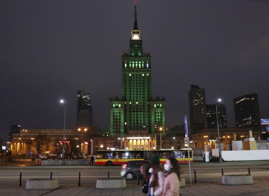 The iconic Palace of Culture in the Polish capital Warsaw, Poland, is lit green Saturday to mark the fifth anniversary of the Paris climate accord.