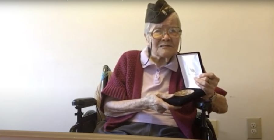 In this image from House Television video, 1st Lt. Elsie Chin Yuen Seetoo, accepts a Congressional Gold Medal during a virtual ceremony broadcast from Capitol Hill in Washington, Wednesday, Dec. 9, 2020.