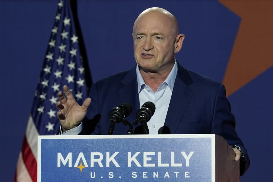 Mark Kelly, Arizona Democratic candidate for U.S. Senate, speaks at an election night event Tuesday, Nov. 3, 2020 in Tucson, Ariz. (AP Photo/Ross D.