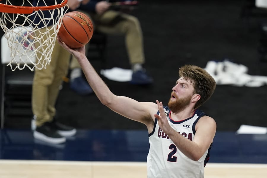 Gonzaga&#039;s Drew Timme goes to the basket against West Virginia in Indianapolis. It was the last game the Zags played and that was Dec. 2. Coach Mark Few of top-ranked Gonzaga says the suspension of basketball activities for the past two weeks because of the coronavirus pandemic has &#039;&#039;not helped us in any way, shape or form.?