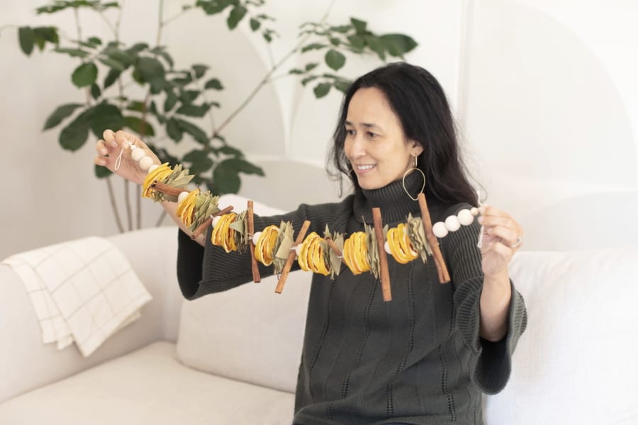 San Francisco Bay-area based Mariam Naficy, founder of online design marketplace Minted, has been making garlands this year out of various materials, including fragrant dried orange slices.