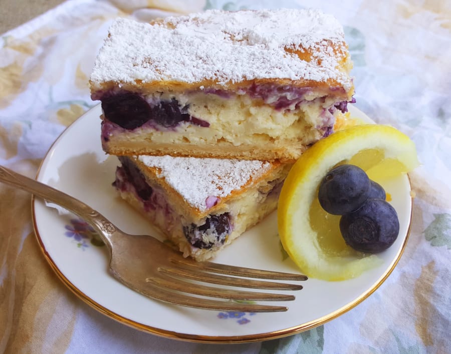 These lemon berry cheesecake bars, with an upper and lower crust made of crescent roll dough, are absolutely heavenly.