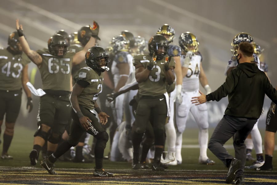 Army quarterback Tyhier Tyler celebrates after defeating Navy in an NCAA college football game Saturday, Dec. 12, 2020, in West Point, N.Y.