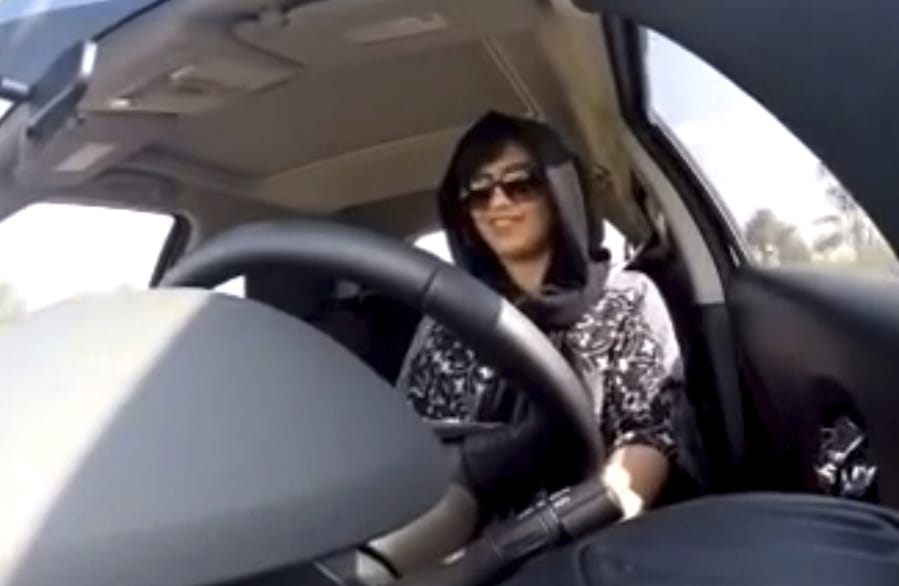 FILE - In this Nov. 30, 2014 image made from video released by Loujain al-Hathloul, al-Hathloul drives towards the United Arab Emirates - Saudi Arabia border before her arrest on Dec. 1 in Saudi Arabia. Al-Hathloul, one of Saudi Arabia&#039;s most prominent women&#039;s rights activists,  who pushed for the right to drive, was sentenced on Monday, Dec. 28, 2020, to nearly six years in prison under a vague and broadly-worded law aimed at combating terrorism, according to state-linked media. Her case and imprisonment for the past two and a half years have drawn criticism from rights groups, members of the U.S. Congress and European Union lawmakers.