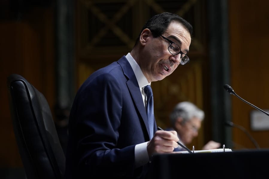 Treasury Secretary Steven Mnuchin testifies during a Senate Banking Committee hearing on &#039;The Quarterly CARES Act Report to Congress&#039; on Capitol Hill in Washington, Tuesday, Dec. 1, 2020.