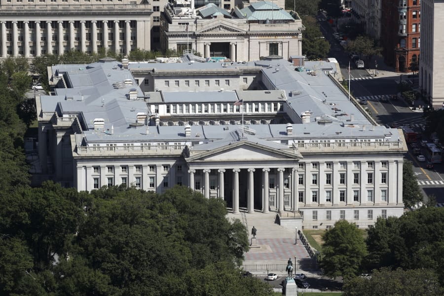 FILE - The U.S. Treasury Department building viewed from the Washington Monument, Wednesday, Sept. 18, 2019, in Washington. Hackers got into computers at the U.S. Treasury Department and possibly other federal agencies, touching off a government response involving the National Security Council. Security Council spokesperson John Ullyot said Sunday, Dec. 13, 2020 that the government is aware of reports about the hacks.
