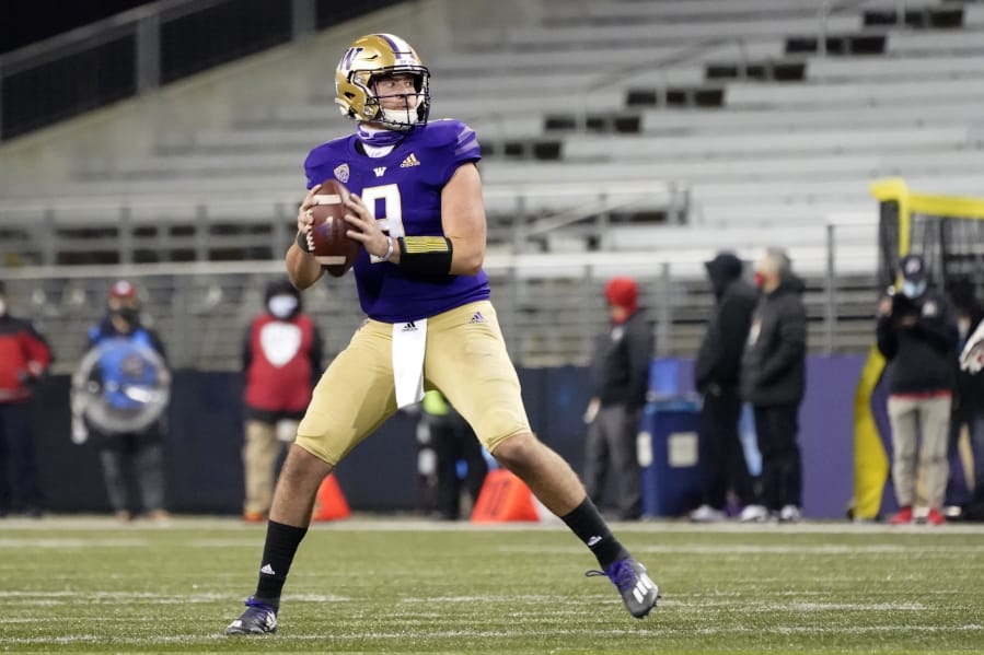Washington quarterback Dylan Morris drops back to pass against Utah during the second half of an NCAA college football game Saturday, Nov. 28, 2020, in Seattle. (AP Photo/Ted S.