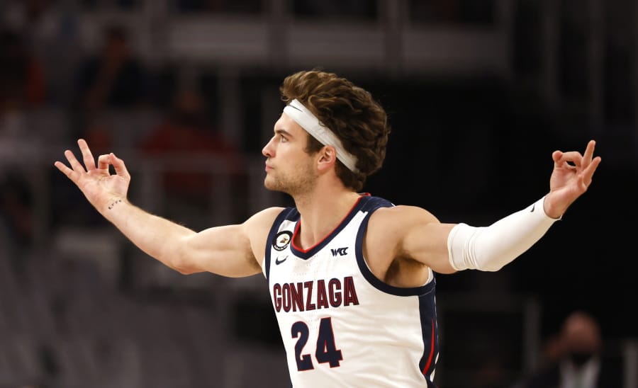 Gonzaga forward Corey Kispert (24) reacts after making a 3-point basket against Virginia during the first half Saturday, Dec. 26, 2020, in Fort Worth, Texas. Kispert made a career-high nine 3-pointers in the game, scoring 32 points as the Bulldogs won 98-75.