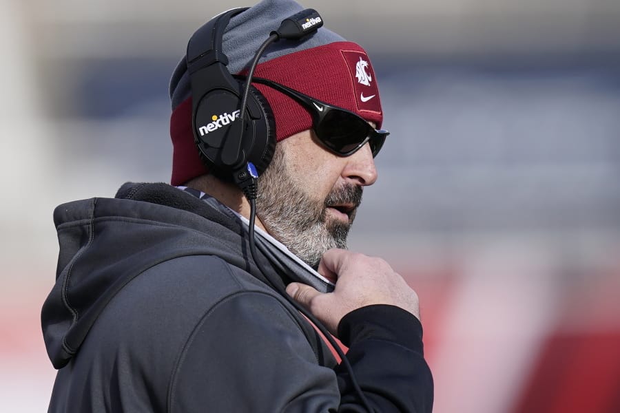 Washington State head coach Nick Rolovich looks on during the first half of an NCAA college football game against Utah, Saturday, Dec. 19, 2020, in Salt Lake City.