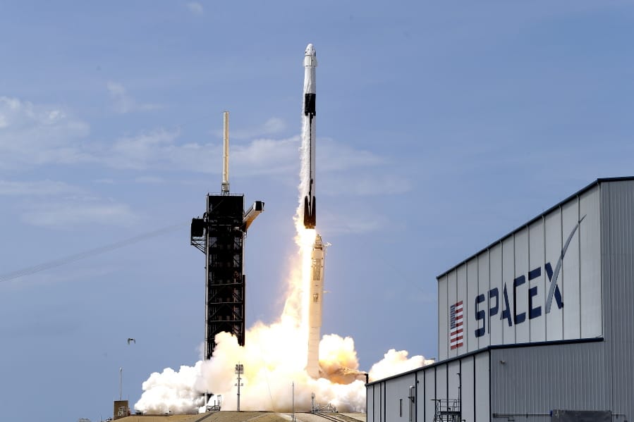 SpaceX Falcon 9, with NASA astronauts Doug Hurley and Bob Behnken in the Dragon crew capsule, lifts off from the Kennedy Space Center in Cape Canaveral, Fla., on May 30.