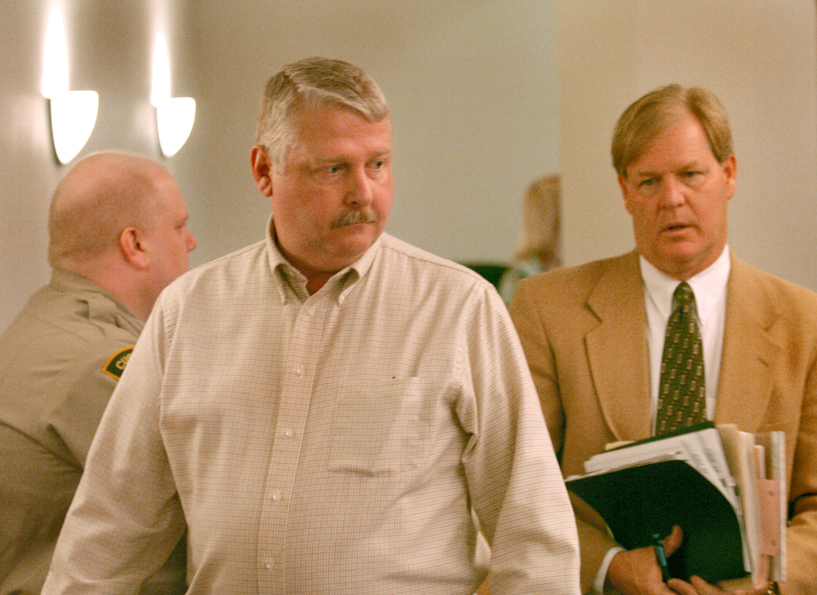 Thomas Moody, left, appears in Clark County Superior Court in 2004 with his attorney Tom Phelan.