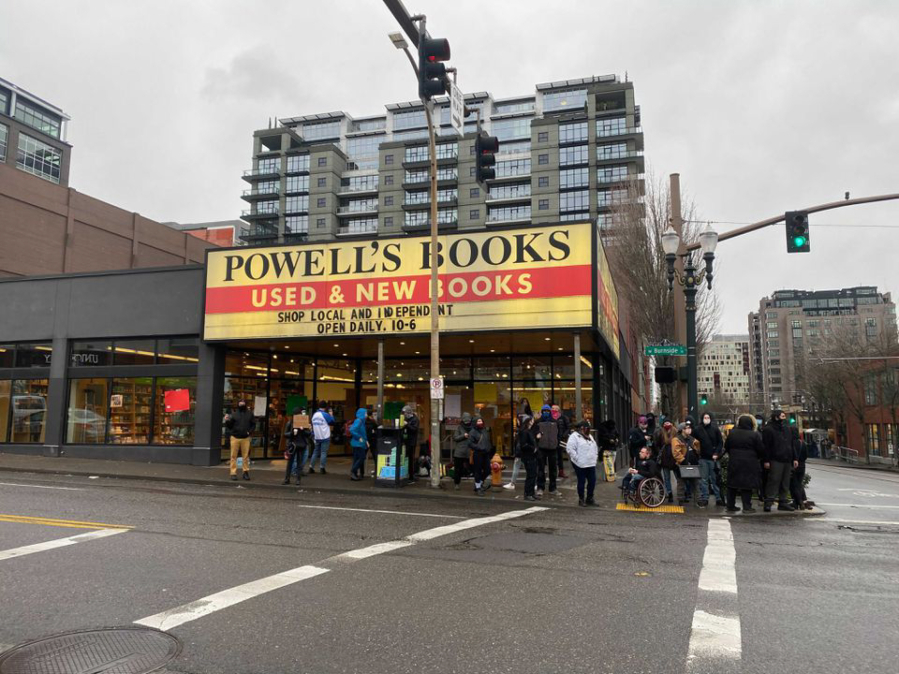 Demonstrators gather at Powell&#039;s Books on West Burnside in downtown Portland on Jan. 1 to protest the listing of Andy Ngo&#039;s book on the Powell&#039;s website.