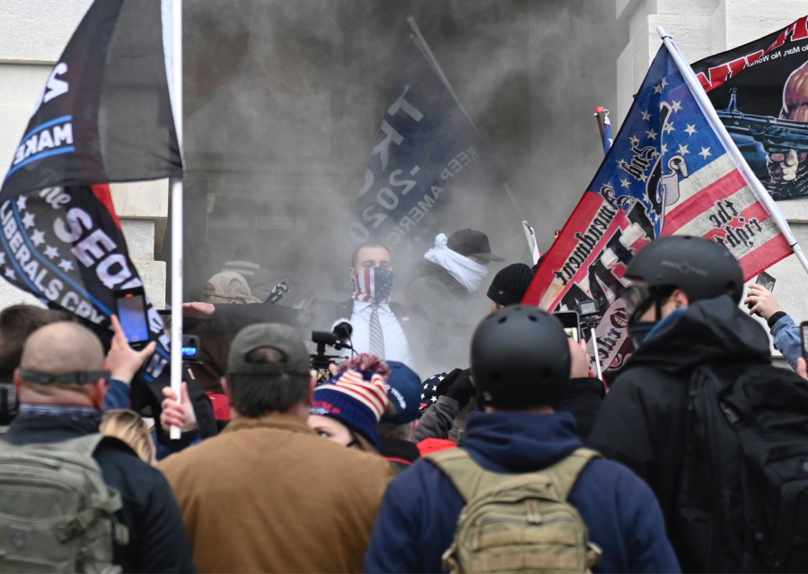 Trump supporters are tear gassed outside the U.S. Capitol in Washington, D.C. on Wednesday, Jan. 6, 2021. Demonstrators breeched security and entered the Capitol as Congress debated the a 2020 presidential election Electoral Vote Certification.