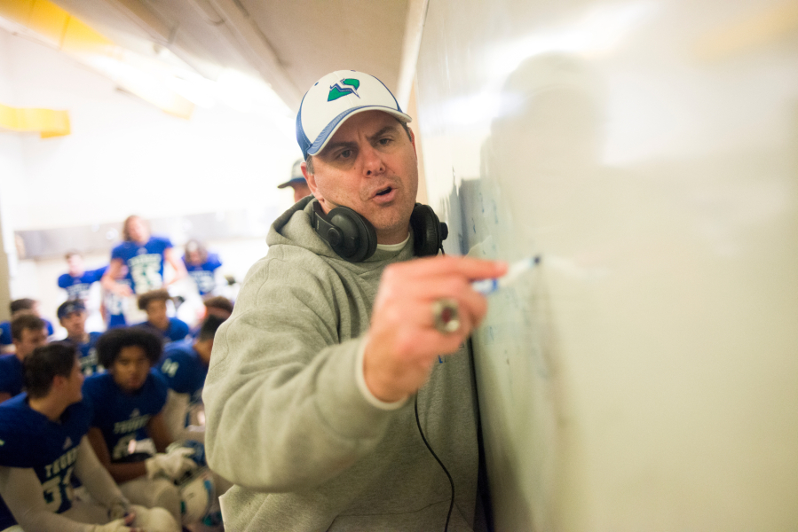 Mountain View head coach Adam Mathieson draws plays for his team during halftime of a game against Squalicum at McKenzie Stadium. As athletic director, Mathieson has been tested in a different way by the uncertainty posed by COVID-19.