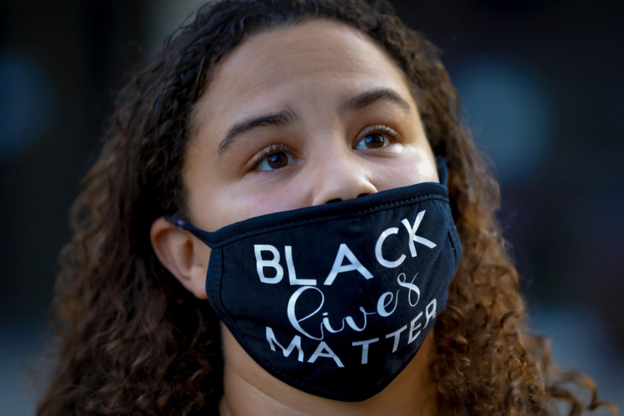 Mattique Gray from Serra Mesa was among the group of demonstrators who gathered at the San Diego Civic Center on Wednesday, Nov. 4, 2020, in San Diego, California, before before taking off in a protest march heading to Waterfront Park at the Administration building. (Nelvin C.