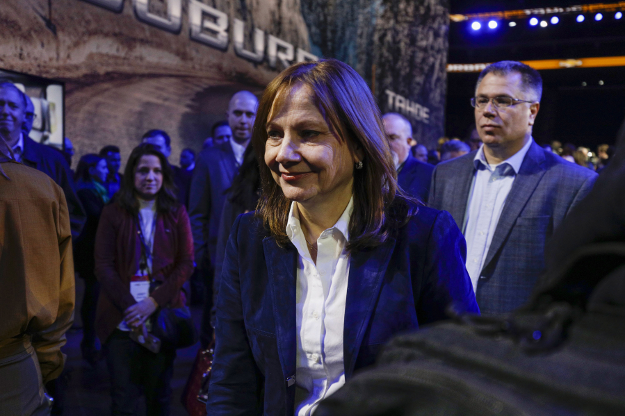 Mary Barra, chairman and CEO of General Motors, is shown at the reveals of the new 2021 Chevrolet Suburban and 2021 Chevrolet Tahoe SUVs at Little Caesars Arena in 2019 in Detroit. Barra said the automaker will bring to market 30 all-electric models globally by the middle of the decade.