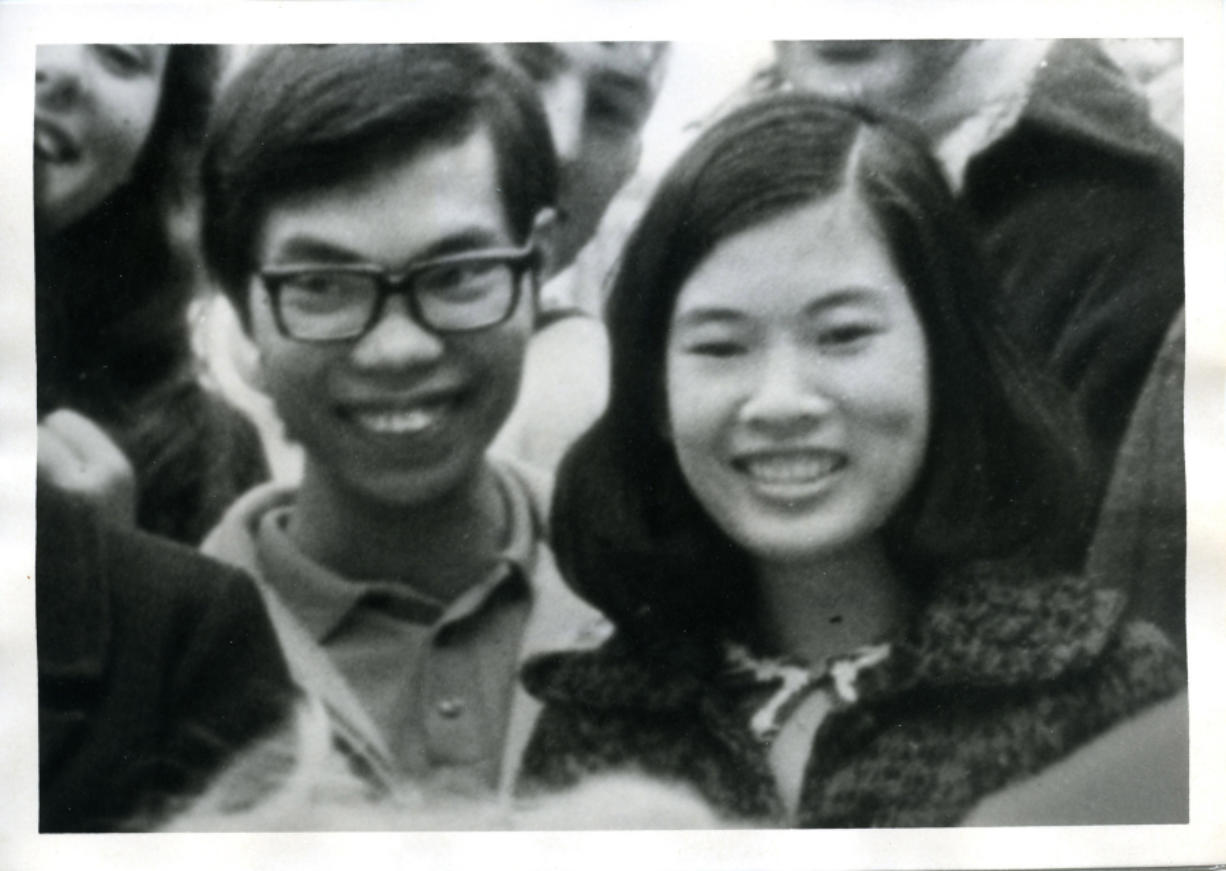 Tim and Cathy Tran watch a pie-eating contest in 1971 while studying at Pacific University in Forest Grove, Ore.