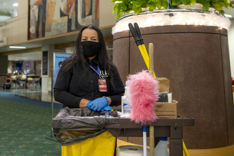 Portland International Airport janitor Agustina Mata Velazquez, 43, has worked the overnight shift for a little more than a year. &quot;I like the overnight shift because it works with my schedule and my six kids,&quot; Mata Velazquez said.
