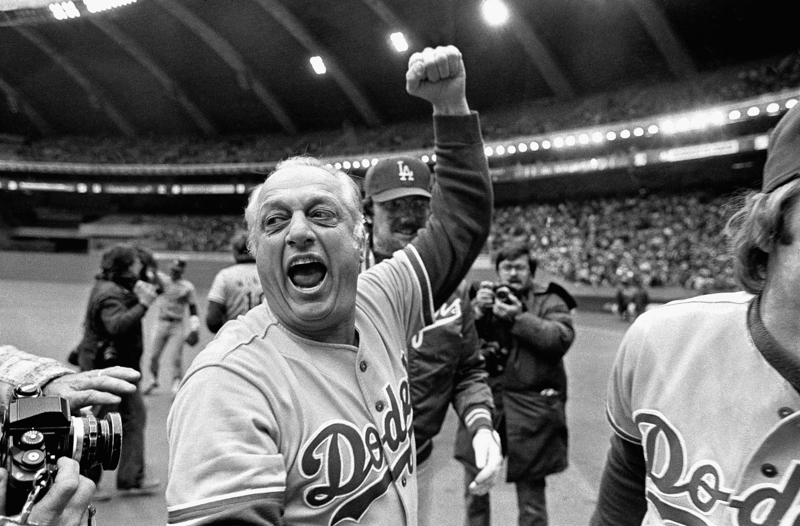 Los Angeles Dodgers manager Tom Lasorda celebrates after the Dodgers beat the Montreal Expos for the National League title in Montreal, in this Monday, Oct. 19, 1981, file photo. Tommy Lasorda, the fiery Hall of Fame manager who guided the Los Angeles Dodgers to two World Series titles and later became an ambassador for the sport he loved during his 71 years with the franchise, has died. He was 93. The Dodgers said Friday, Jan. 8, 2021, that he had a heart attack at his home in Fullerton, Calif.